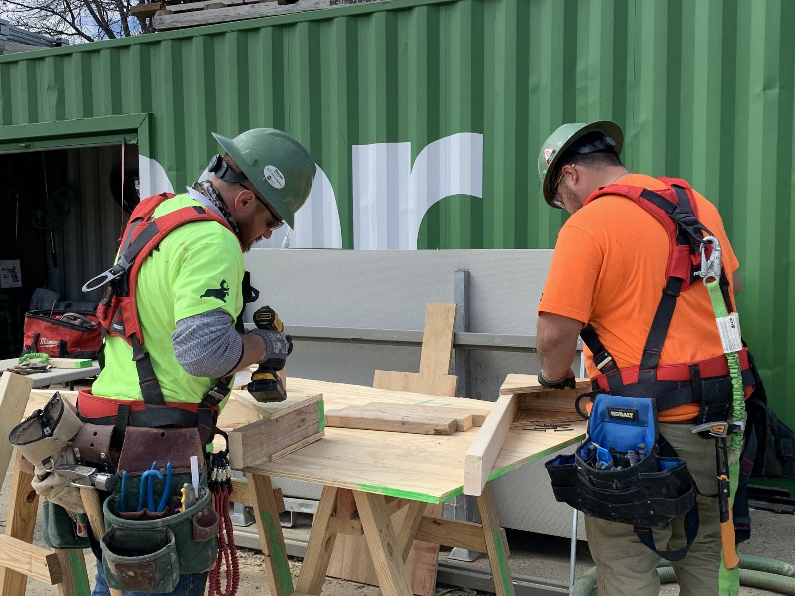 Carpenters outside working